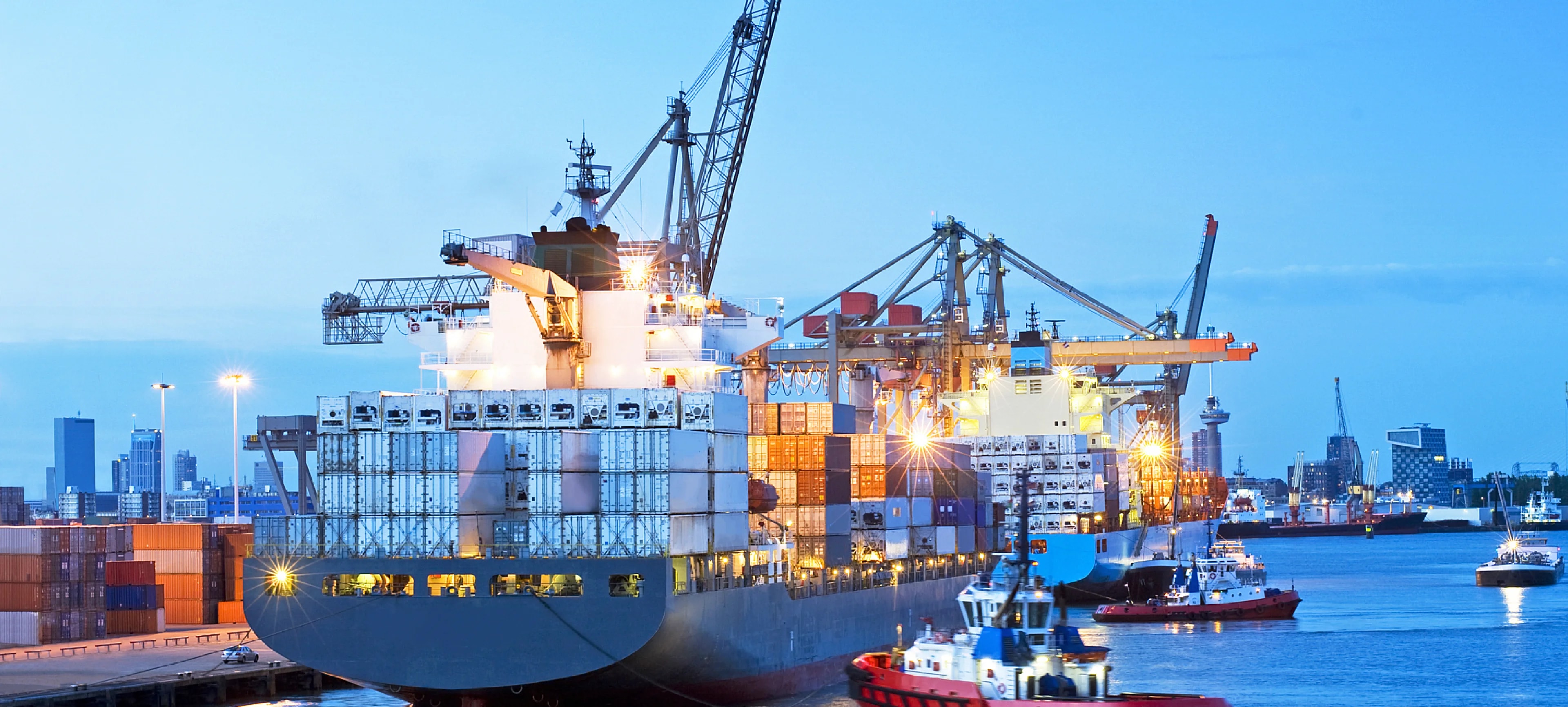Container vessel arriving at a modern port